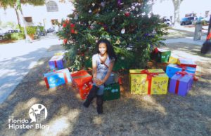 NikkyJ in front on Christmas tree in St Augustine Florida