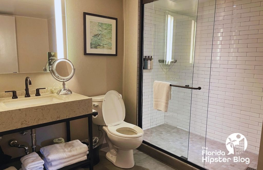 Things to do in Tampa Bay, Florida Hotel Alba. Sleek and modern bathroom with luxurious touches and glass shower. Keep reading to find out more about one of the best hotels in Tampa, Hotel Alba Tampa, Tapestry Collection by Hilton. 