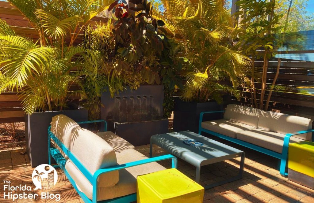 Things to do in Tampa Bay, Florida Hotel Alba. Shaded sitting area surrounded by lush greenery. Keep reading to find out more about one of the best hotels in Tampa, Hotel Alba Tampa, Tapestry Collection by Hilton. 