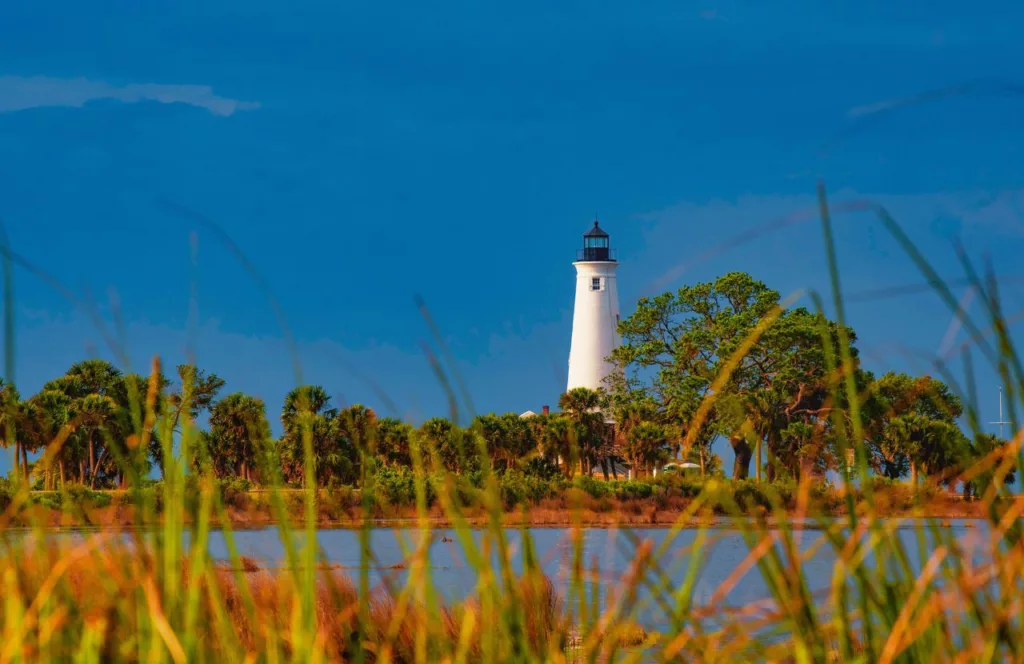 St. Marks Wildlife Refuge Lighthouse on the Gulf of Mexico coastline. Keep reading to get the best things to do in the Florida Panhandle.