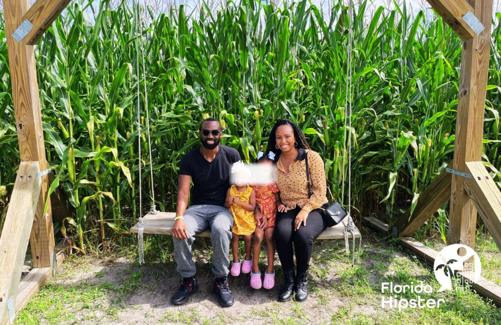 NikkyJ and Family at Corn Maze Field at Great Scott Farms Fall Festival in Mount Dora, Florida