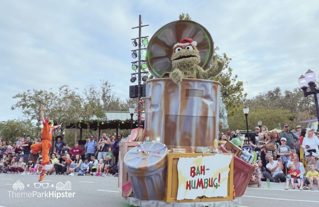 SeaWorld Orlando Resort Christmas Celebration Oscar the Grouch Sesame Street Land Christmas Parade. Keep reading to learn more about SeaWorld Orlando Sesame Street Land.